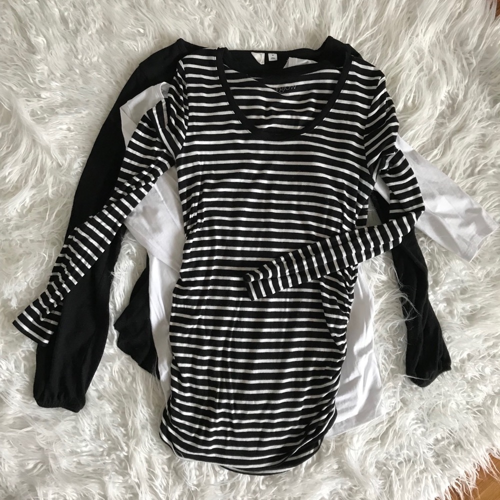 Selling as bundle.  Three maternity shirts.